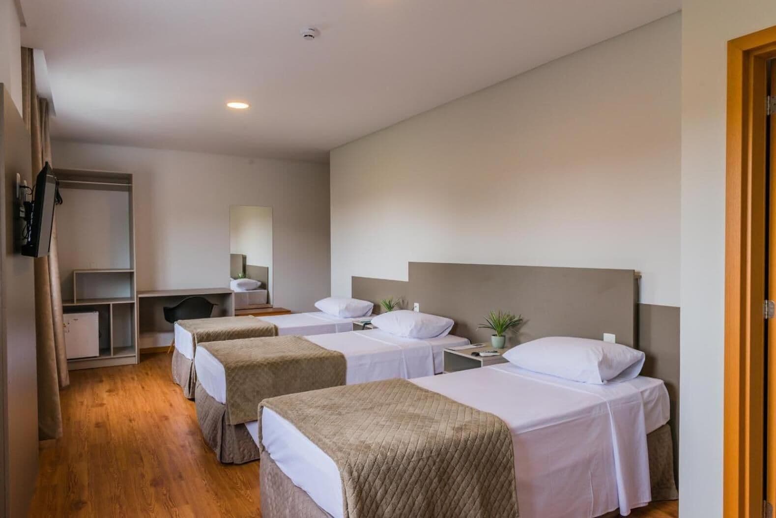 deluxe triple room | 1 bedroom, minibar, desk, laptop workspace