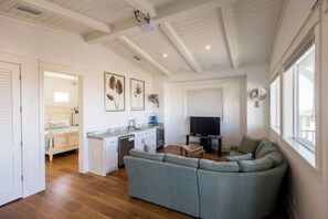 Flat-screen TV, DVD player, books