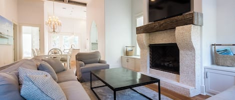 Flat-screen TV, DVD player, books