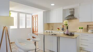 Apartment, 4 Bedrooms | Private kitchen | Full-size fridge, microwave, oven, stovetop