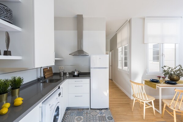Apartment, 2 Bedrooms | Private kitchen | Full-sized fridge, microwave, stovetop, coffee/tea maker