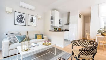 Apartment (2 Bedrooms) | Living area | 32-inch TV with cable channels