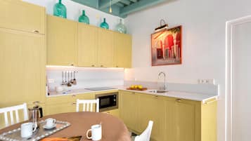 Apartamento (4 Bedrooms) | Cocina privada | Frigorífico grande, microondas, placa de cocina y lavavajillas