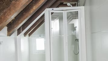 Apartment, 1 Bedroom | Bathroom | Shower, hair dryer, towels, soap