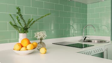 Superior Studio | Private kitchen | Full-sized fridge, microwave, oven, stovetop