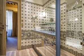 Bathtub, hair dryer, towels