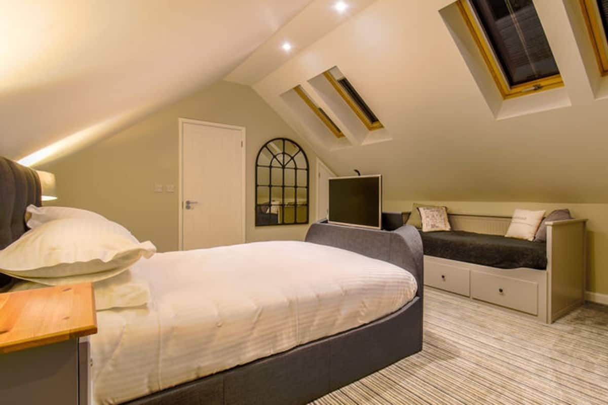 Deluxe kamer, en-suite badkamer | Individueel gedecoreerd, individueel gemeubileerd