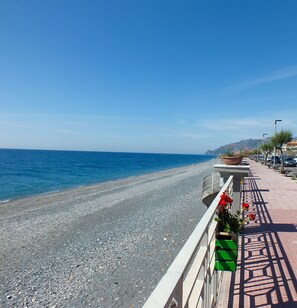 Beach nearby, black sand, beach umbrellas, 2 beach bars