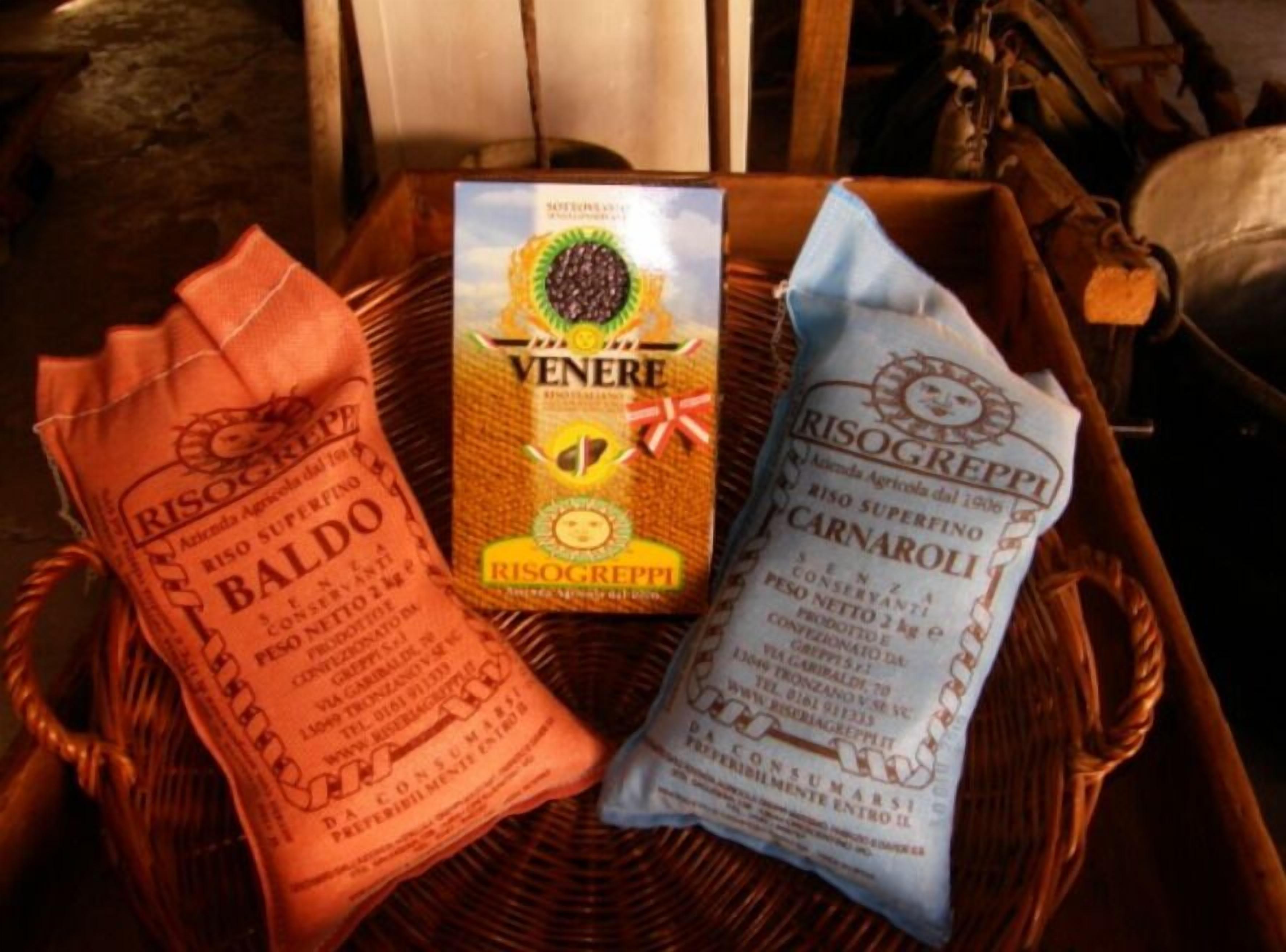 A basket containing three bags of Riso Superfino, a type of rice.