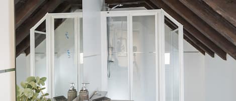 Apartment, 1 Bedroom | Bathroom | Shower, hair dryer, towels, soap