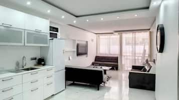 Departamento Confort | Área de sala de estar | Televisión de pantalla plana, Netflix y reproductor de DVD