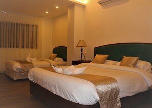 Standard Triple Room | Minibar, blackout drapes, soundproofing, free WiFi - New MerryLand Hotel (Amman)