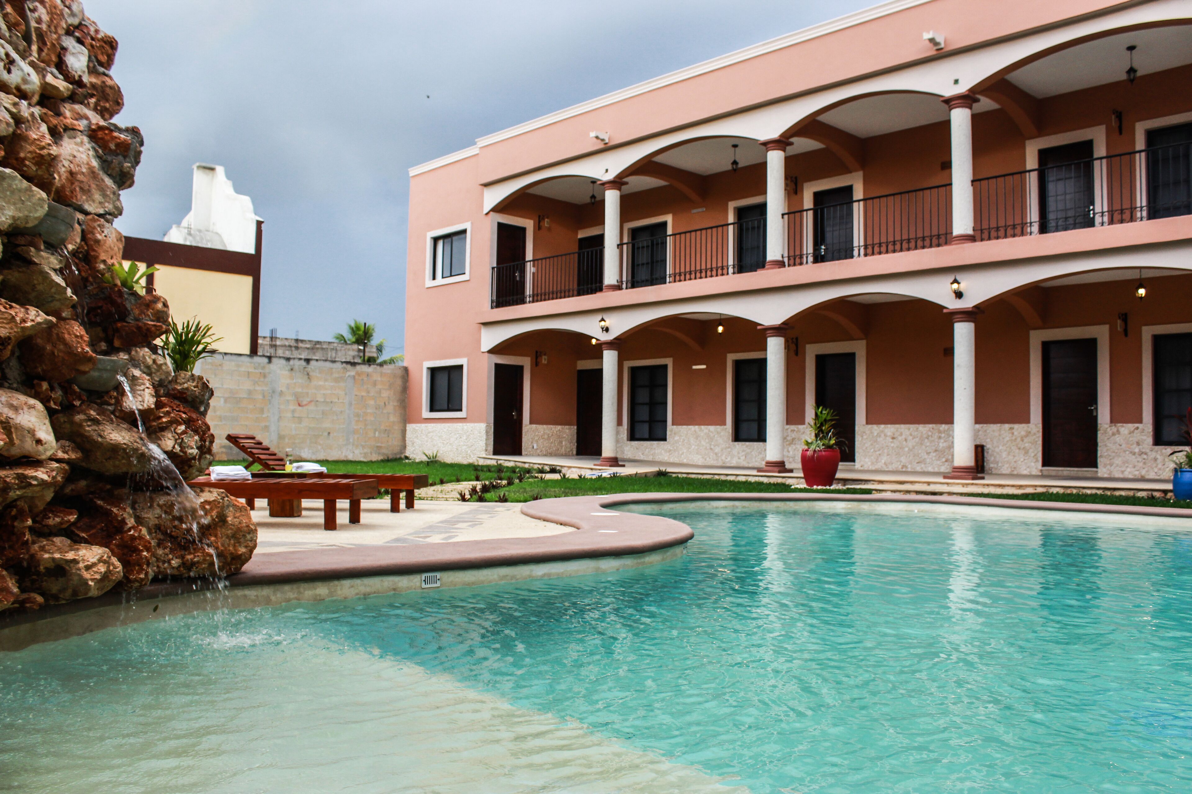 Outdoor pool, open 8:00 AM to 8:00 PM, sun loungers