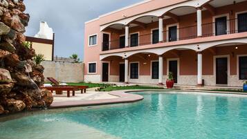 Outdoor pool, open 8:00 AM to 8:00 PM, sun loungers