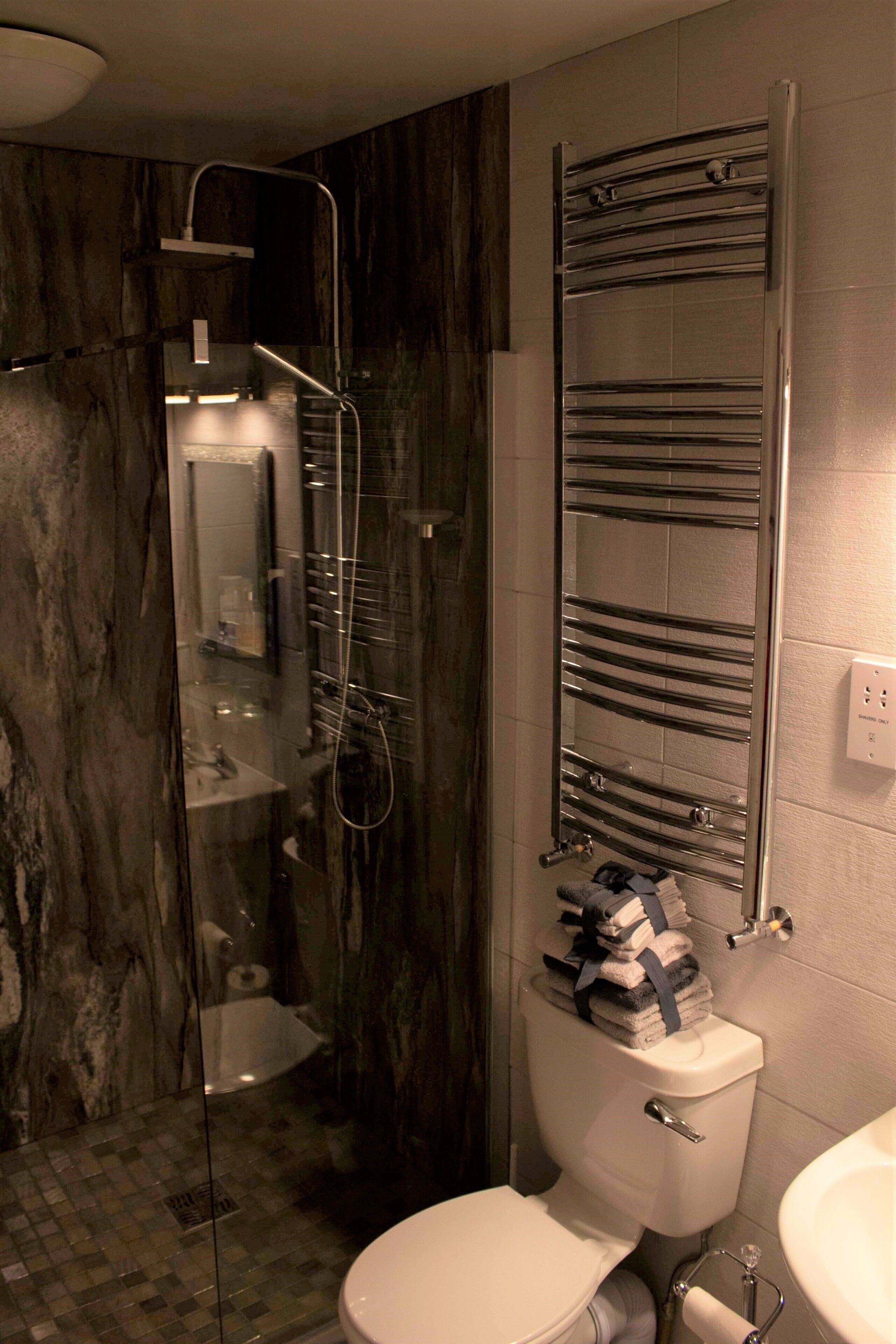 Shower, hair dryer, towels, soap