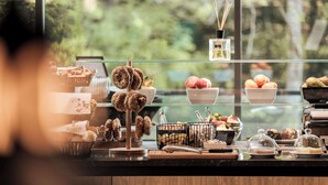 A breakfast buffet with various pastries, fruits, and condiments. - Radisson Hotel Szklarska Poręba (Szklarska Poreba)
