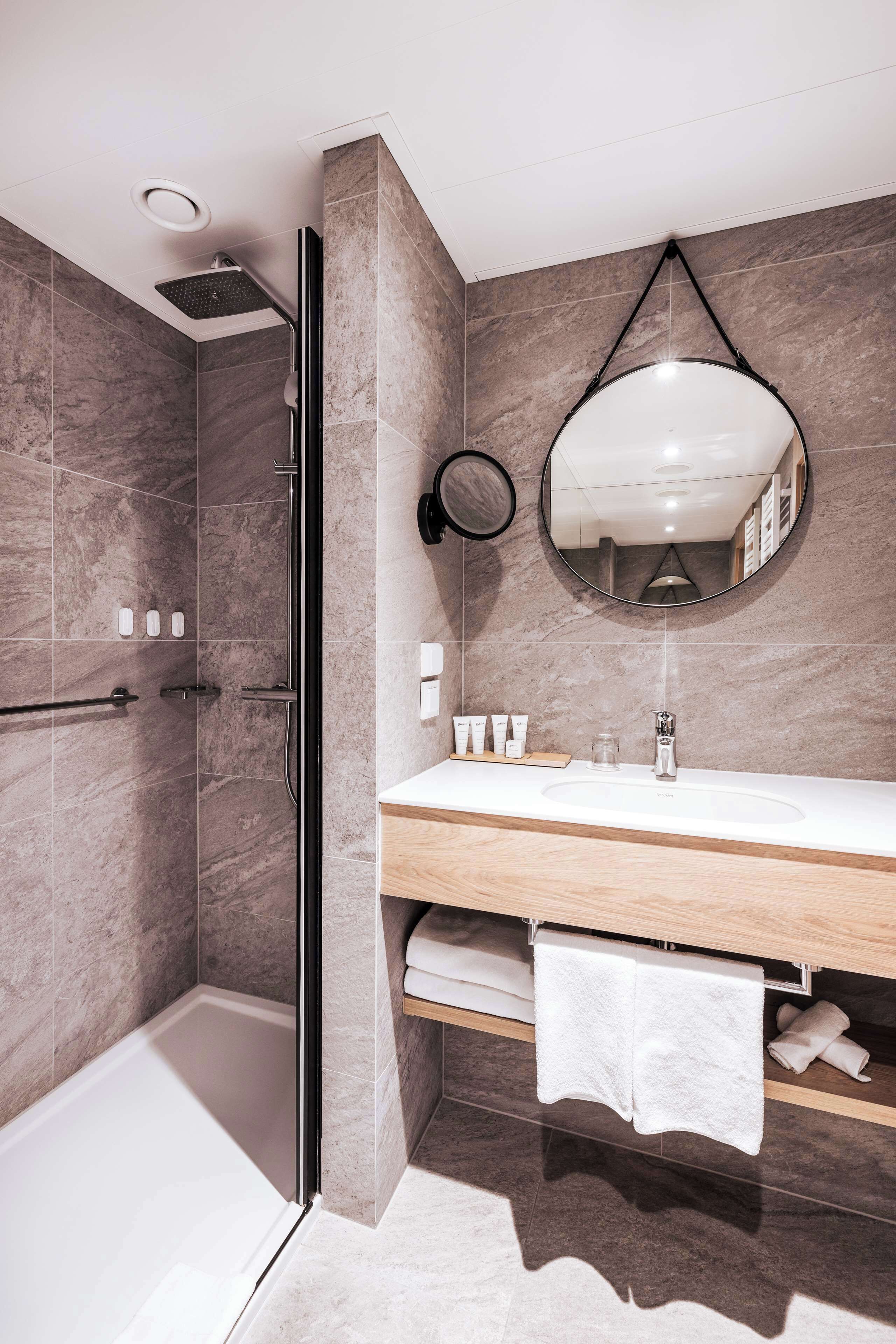 shower, free toiletries, hair dryer, towels