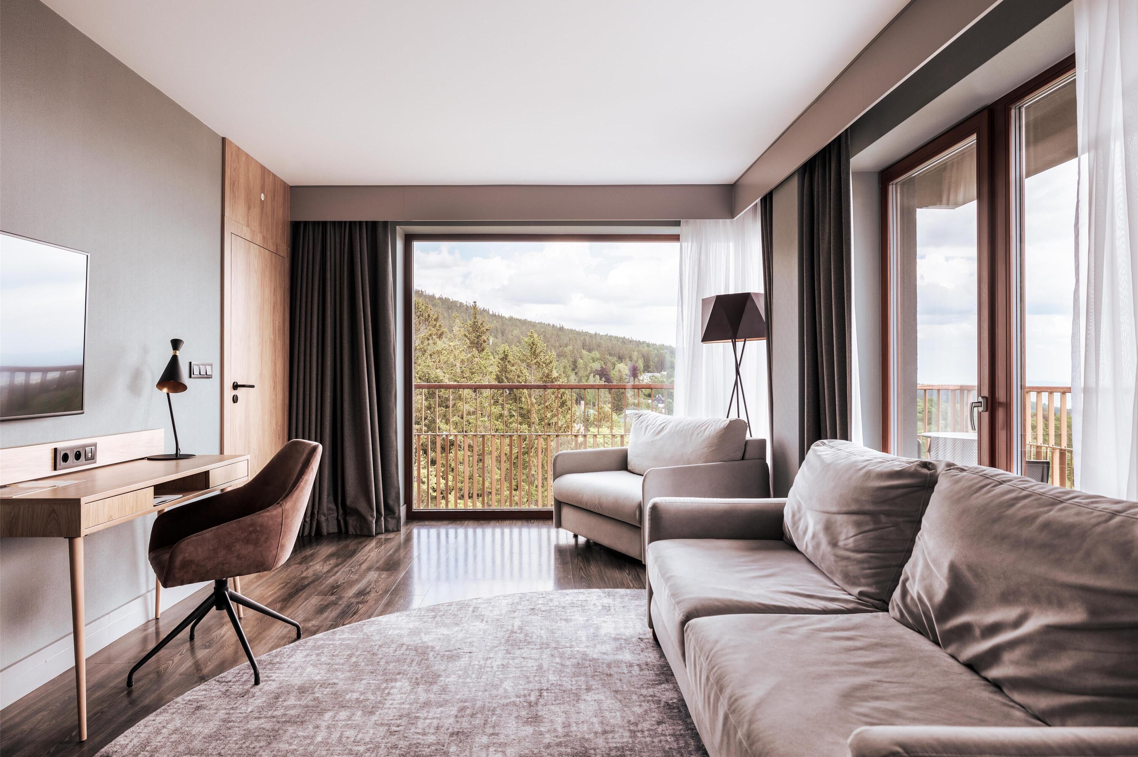 Literie hypoallergénique, minibar, coffres-forts dans les chambres