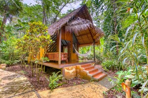 经典平房, 多张床, 花园景观 (1 Queen Bed, 3 Twin Beds) | 1 多间卧室、客房内保险箱、免费 WiFi、床单