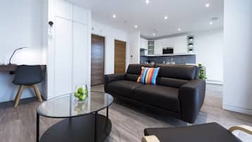 Exclusive Apartment, Roll-in Shower | Living area | 32-inch Smart TV with digital channels, TV, Netflix