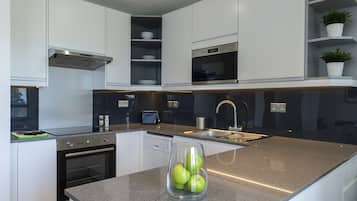 Family Apartment (1st Floor) | Private kitchen | Full-sized fridge, microwave, oven, stovetop