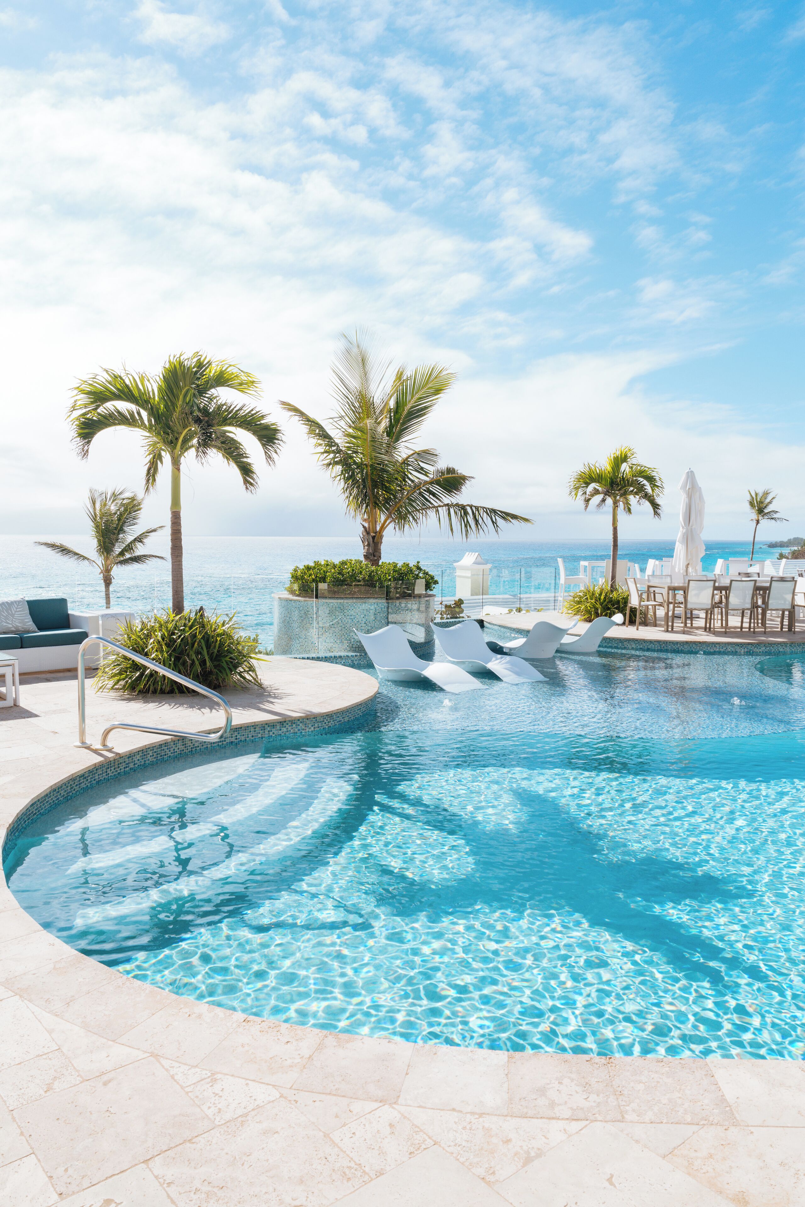 4 outdoor pools, open 8:00 am to 8:00 pm, pool umbrellas, pool loungers