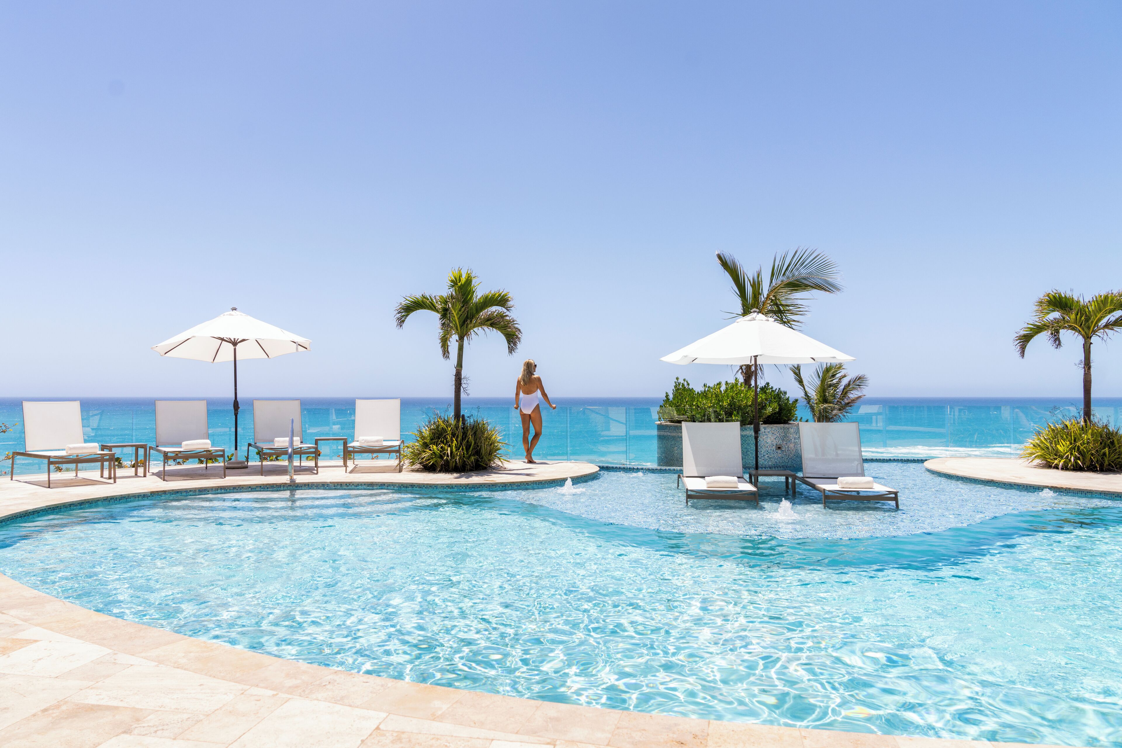 4 outdoor pools, open 8:00 am to 8:00 pm, pool umbrellas, pool loungers