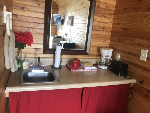 Fridge, microwave, coffee/tea maker, toaster