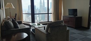 Family Apartment, 2 Bedrooms, City View | Living area | 32-inch LCD TV with cable channels, TV - Famous Service Suites at Times Square (Kuala Lumpur)