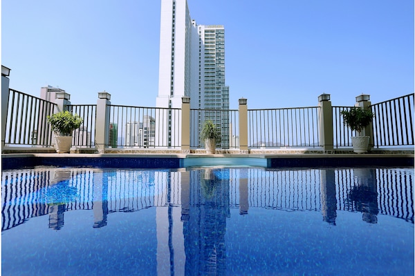 Outdoor pool, open 7:00 AM to 8:30 PM, pool loungers