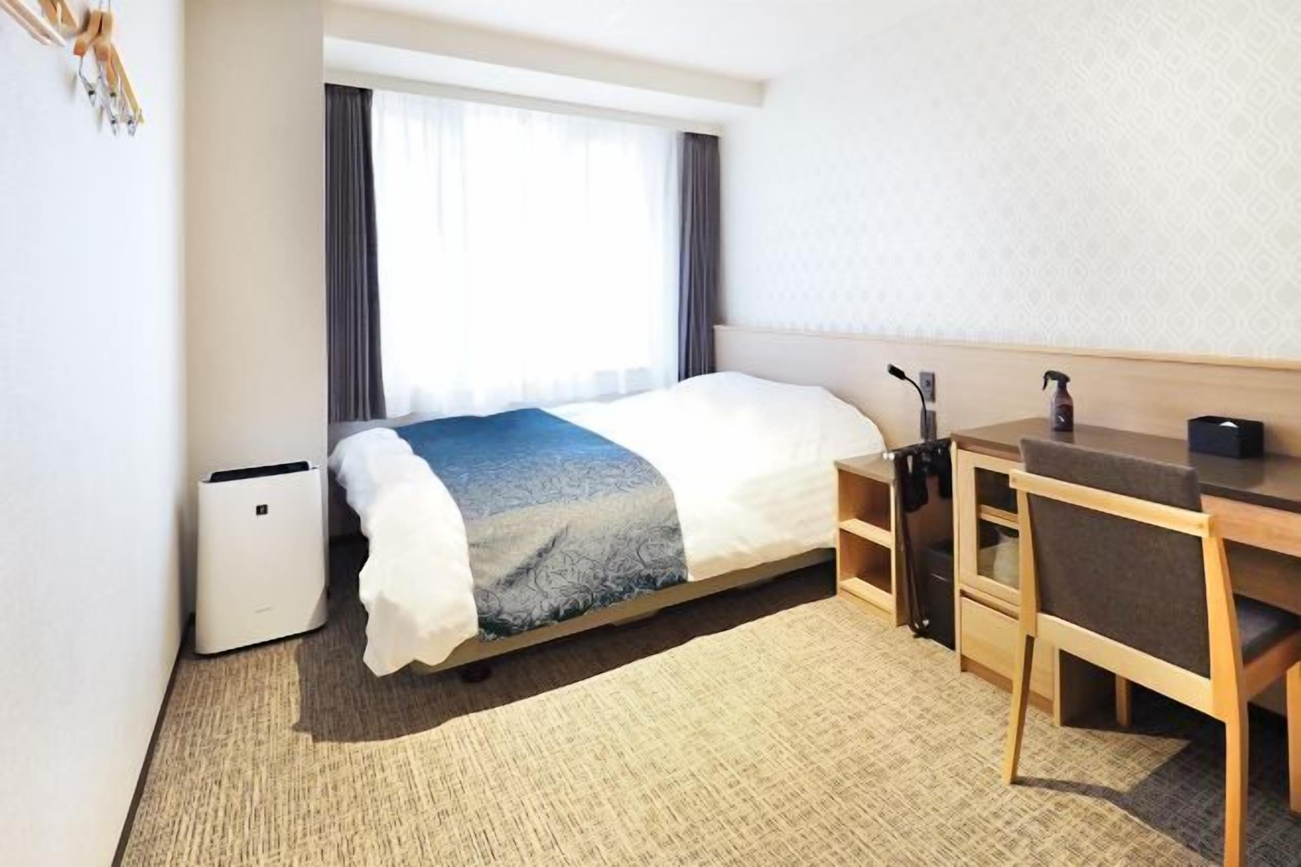 Blackout drapes, iron/ironing board, free WiFi, bed sheets