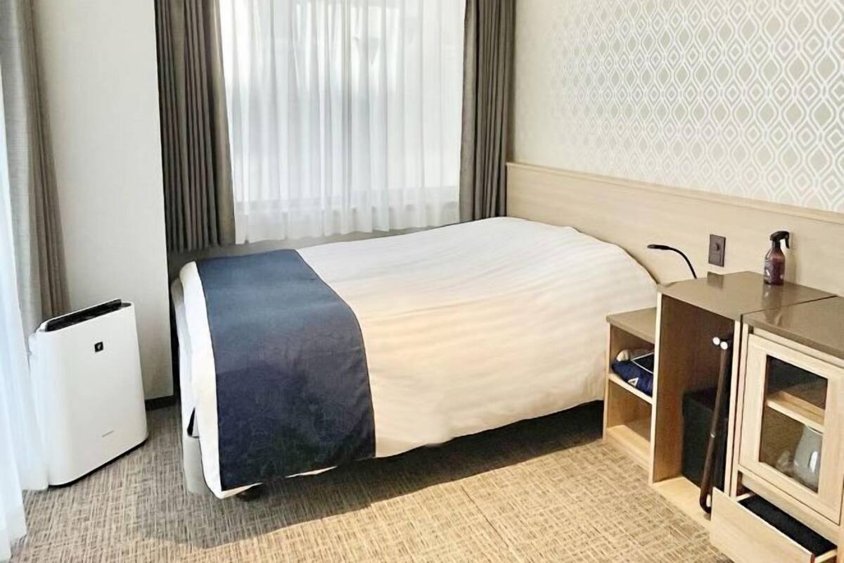 Blackout drapes, iron/ironing board, free WiFi, bed sheets