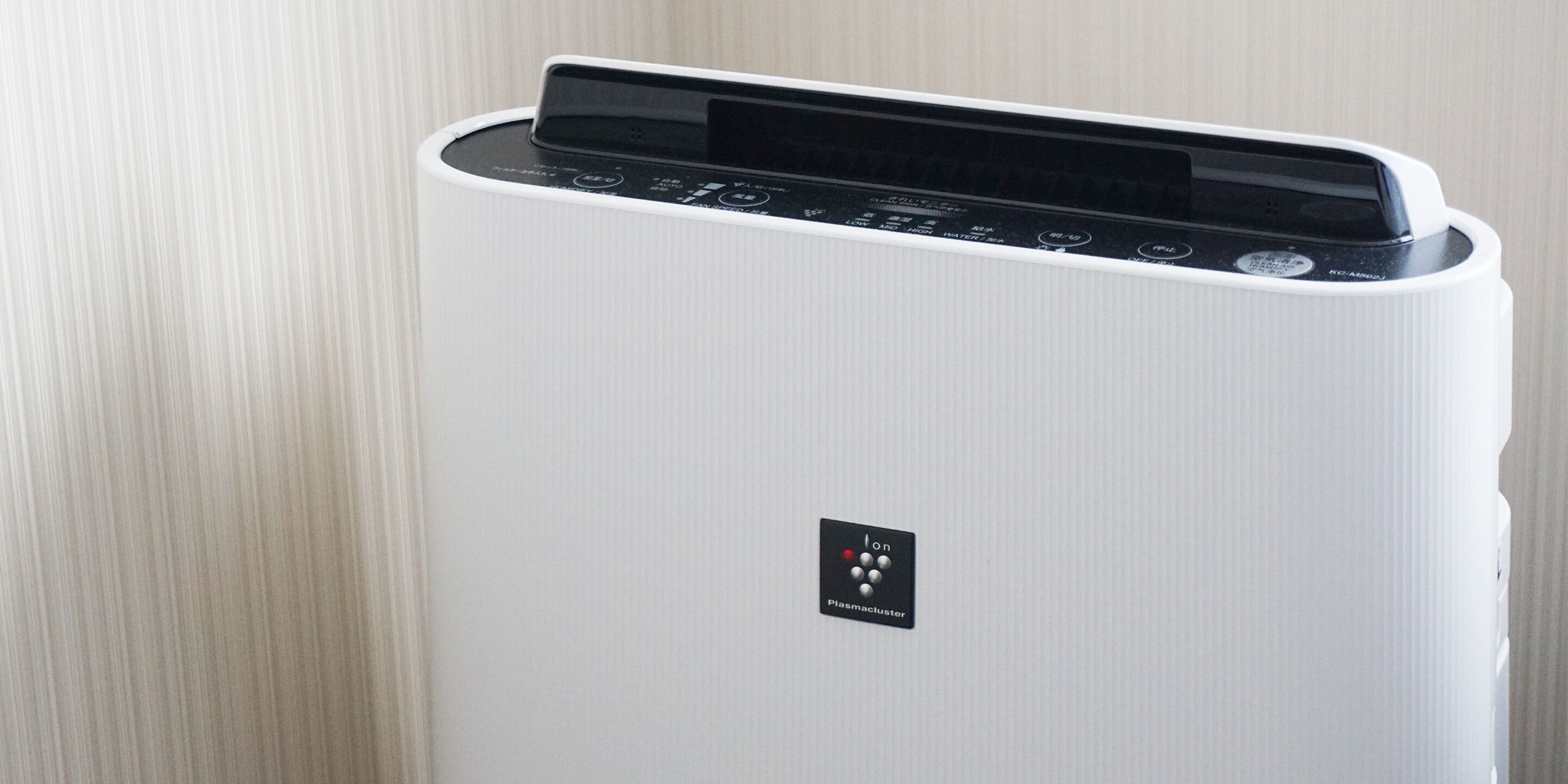 A white, modern-looking device with a control panel and a logo labeled "Ion Plasmacluster."