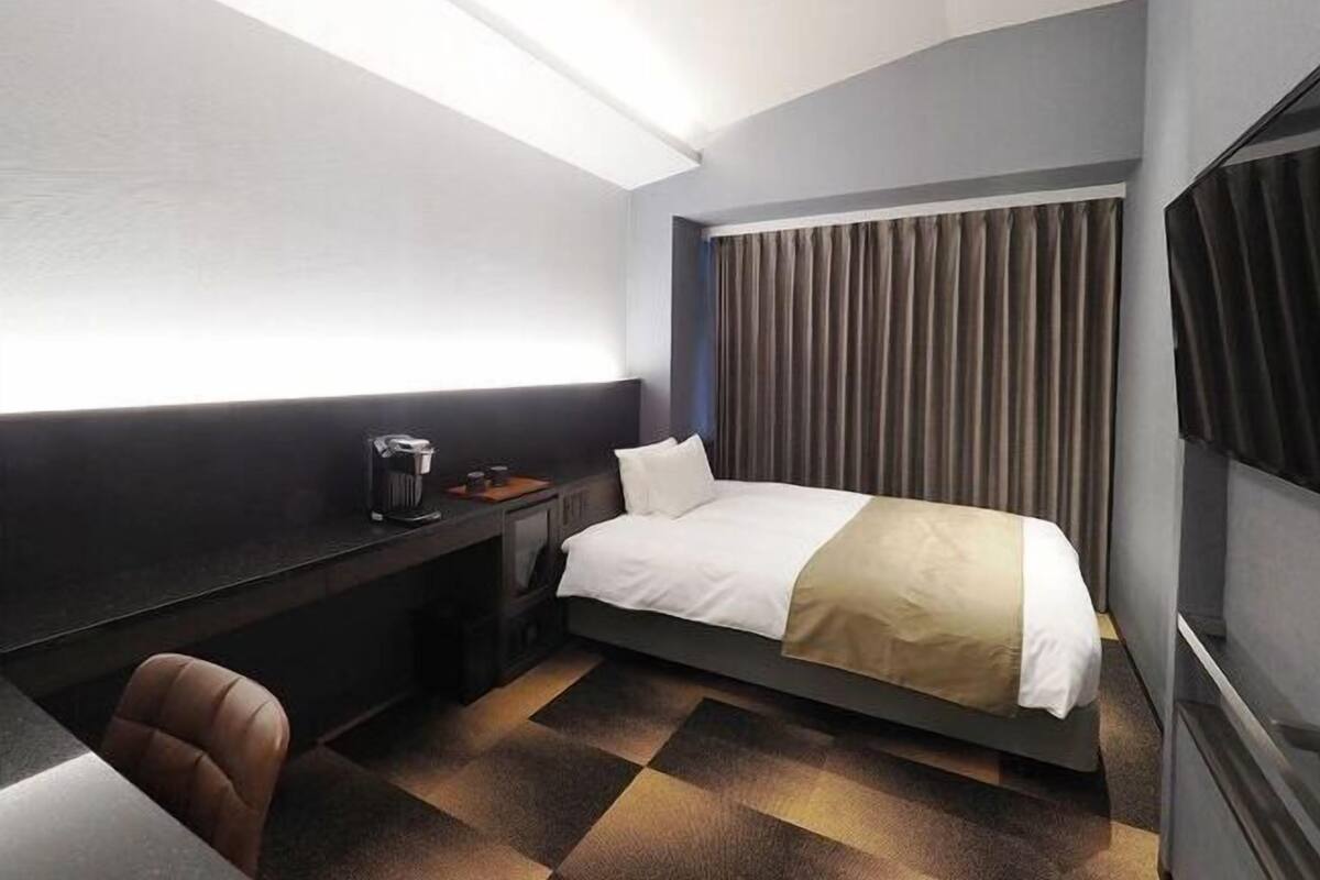 Blackout drapes, iron/ironing board, free WiFi, bed sheets