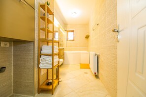Appartement Élite | Douche de la salle de bain