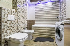 Comfort Apartment | Bathroom | Bathrobes, slippers, bidet, towels - Relax Apartment Coresi Mall (Brasov)