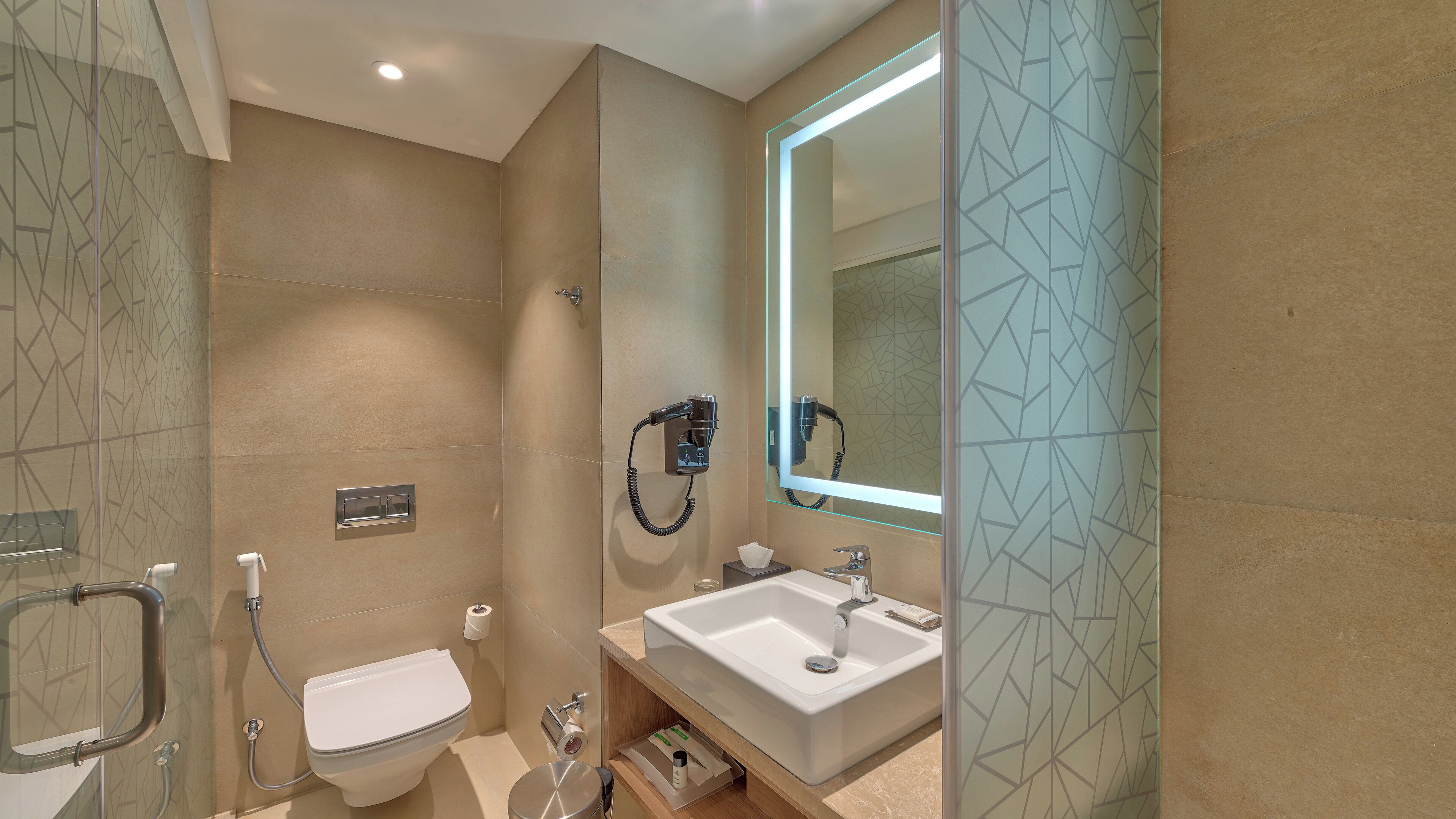 Eco-friendly toiletries, hair dryer (on request), bathrobes, slippers
