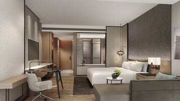 Luxe beddengoed, een minibar, een kluis op de kamer