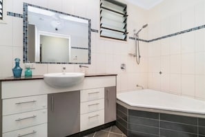 Combined shower/tub, hair dryer, towels, soap