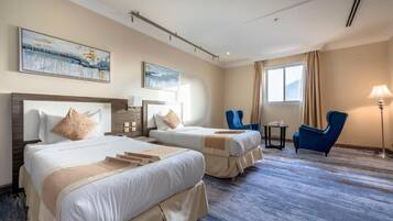 Camera Deluxe con 2 letti singoli | Cassaforte in camera, una scrivania, tende oscuranti, insonorizzazione