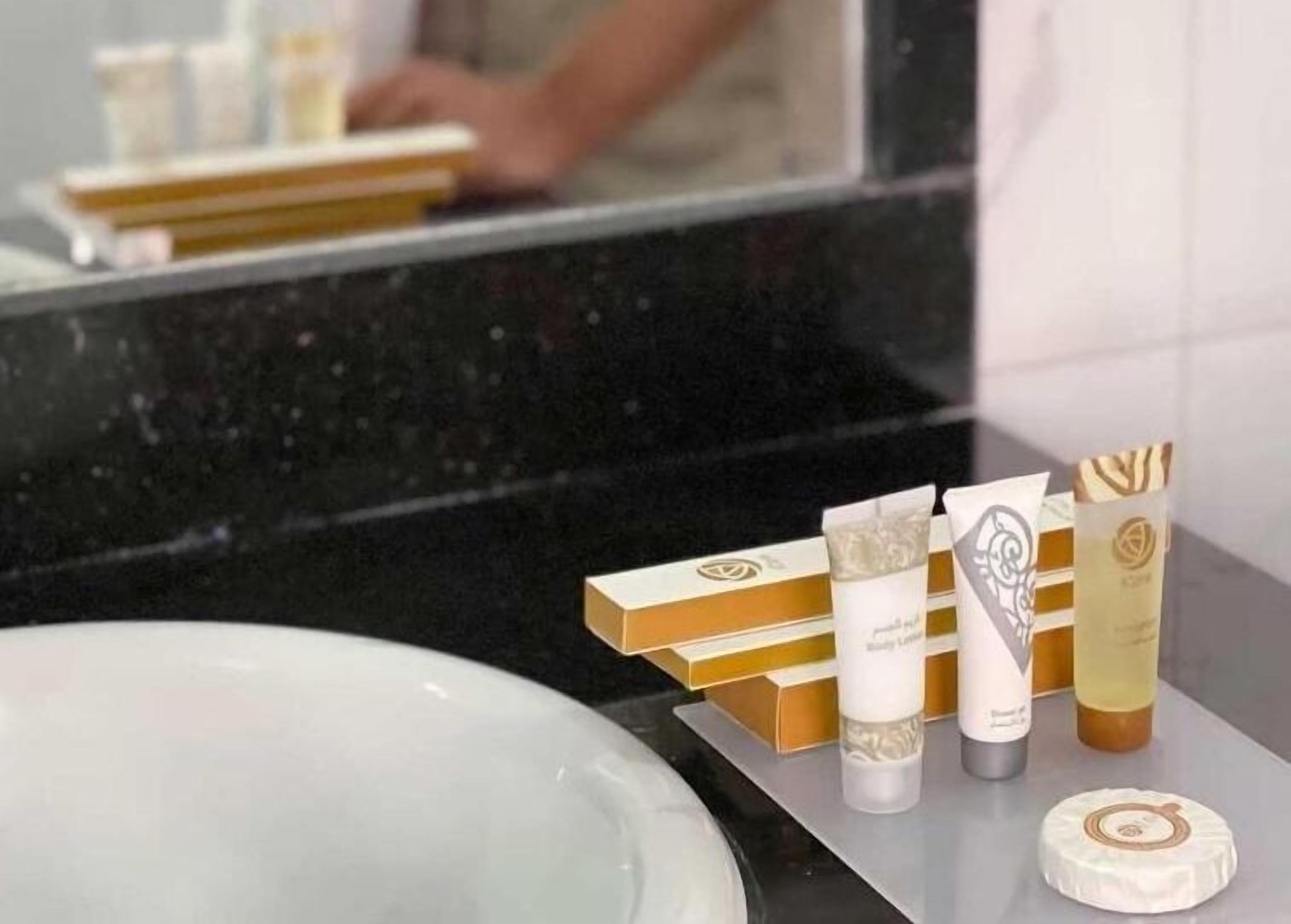 bathtub, free toiletries, hair dryer, bathrobes