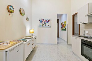 Fridge, oven, dining tables