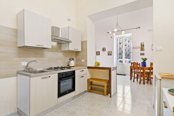 Fridge, oven, dining tables