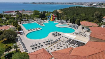 Indoor pool, seasonal outdoor pool, pool umbrellas, pool loungers