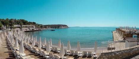 Private beach, sun loungers, beach umbrellas, beach towels