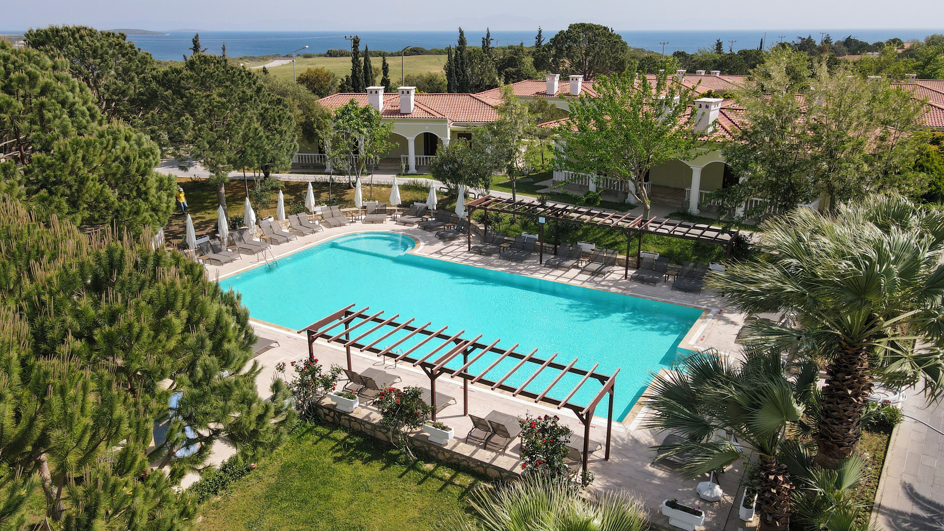Indoor pool, seasonal outdoor pool, pool umbrellas, sun loungers