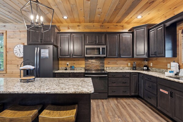 Fridge, microwave, oven, stovetop - Luxury 4 Bedroom with King Bedroom Suites, Hot Tub, Theater, WiFi, Game Room! (Sevierville)