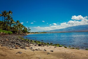 On the beach, sun-loungers, beach towels