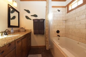 Bathtub, towels, shampoo