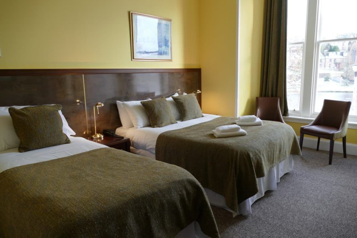 Premier-Dreibettzimmer | Zimmersafe, individuell dekoriert, individuell eingerichtet